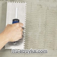 Как декорировать камин при помощи искусственного камня.